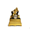 Pendule 1840 jeune homme accoudé